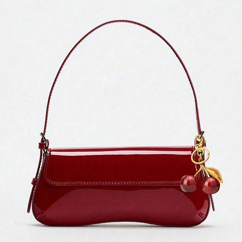 Classic fashion retro style shoulder bag, fashionable, simple, with personalized exquisite pendant.