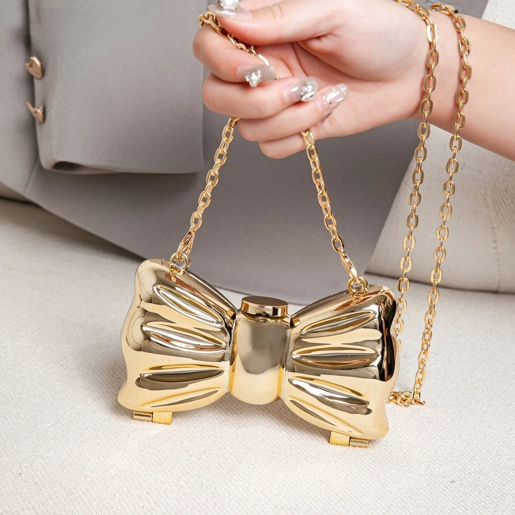 Luxury Fashion Metal Mini Handbag with Bow Clasp Playful Acrylic Bow Design with Shimmering European-Style Chain Crossbody Bag