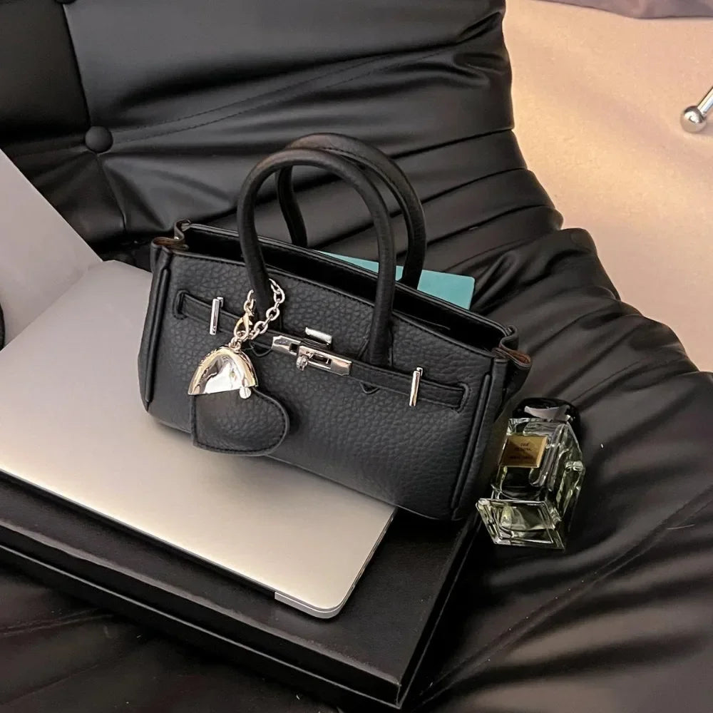 2025 new platinum bag women's versatile commuter high-end handbag messenger bag high value foreign shoulder bag