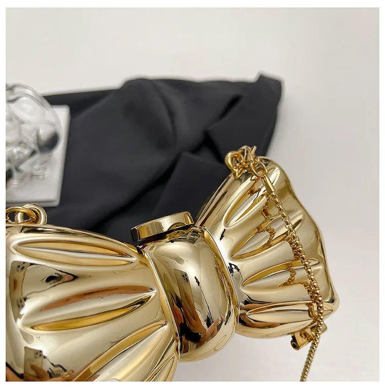 Luxury Fashion Metal Mini Handbag with Bow Clasp Playful Acrylic Bow Design with Shimmering European-Style Chain Crossbody Bag