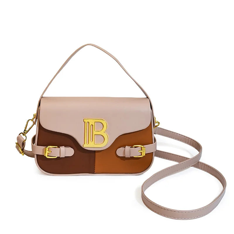 Luxury women's crossbody bag with color-blocking and stitching, box-style multi-color textured light luxury commuter bag.