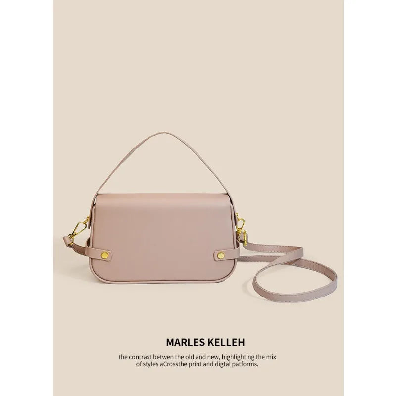 Luxury women's crossbody bag with color-blocking and stitching, box-style multi-color textured light luxury commuter bag.