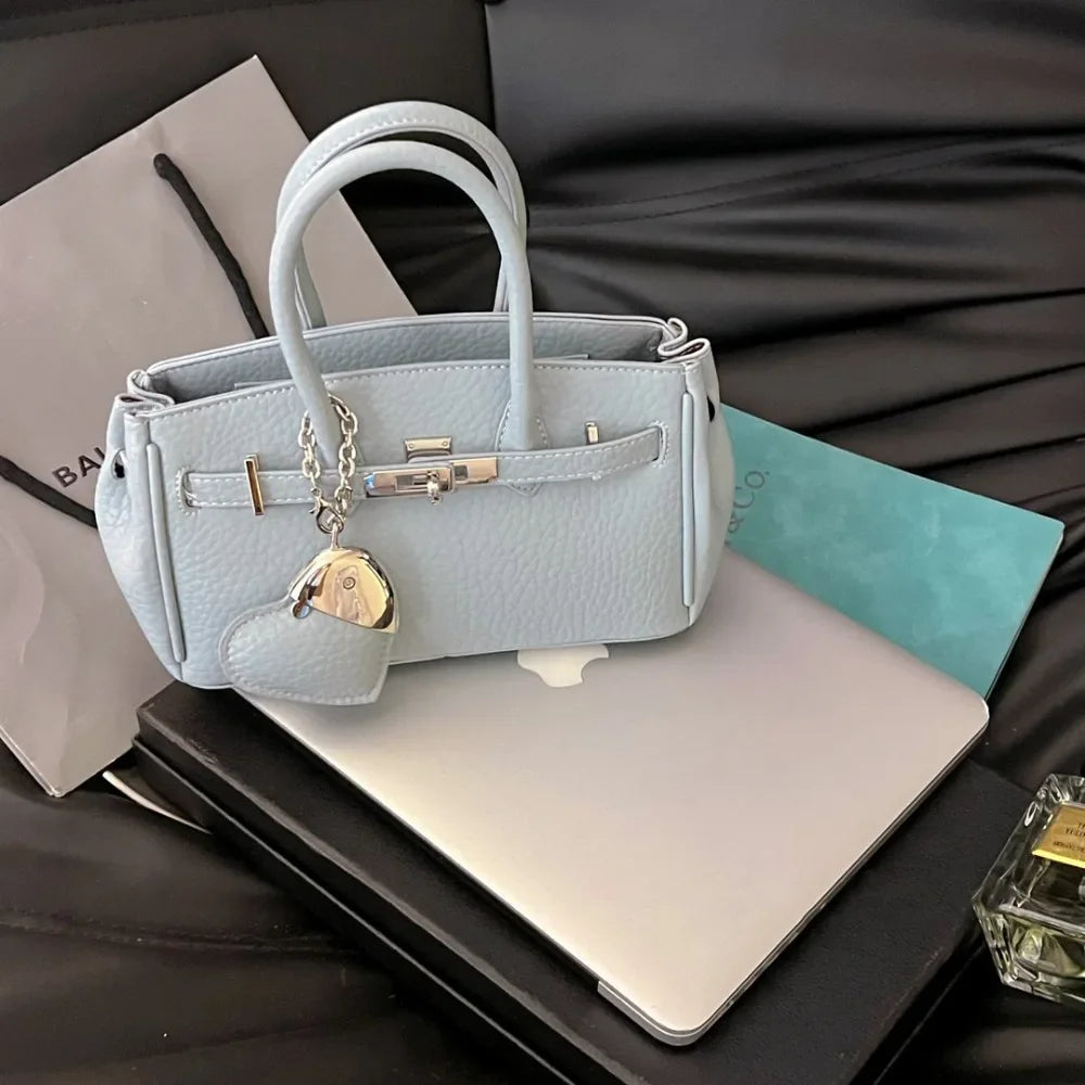 2025 new platinum bag women's versatile commuter high-end handbag messenger bag high value foreign shoulder bag