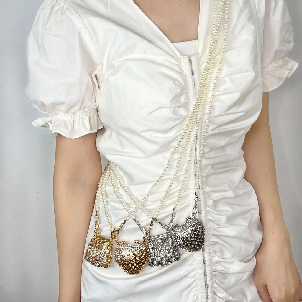 Designer hollowed out heart shaped dinner bagS for women fashionable metal style shoulder bag  mini accessory bag