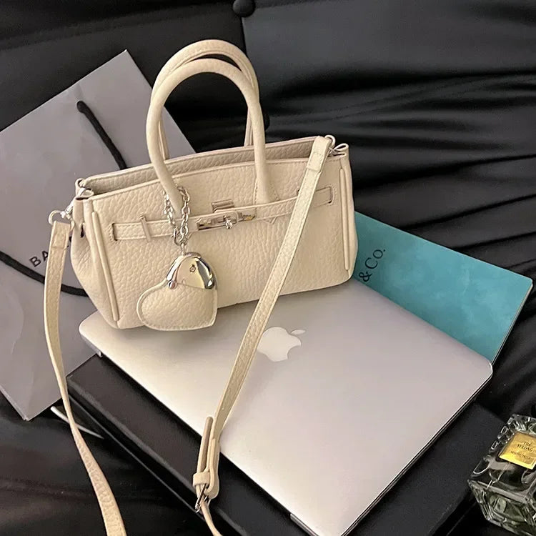 2025 new platinum bag women's versatile commuter high-end handbag messenger bag high value foreign shoulder bag