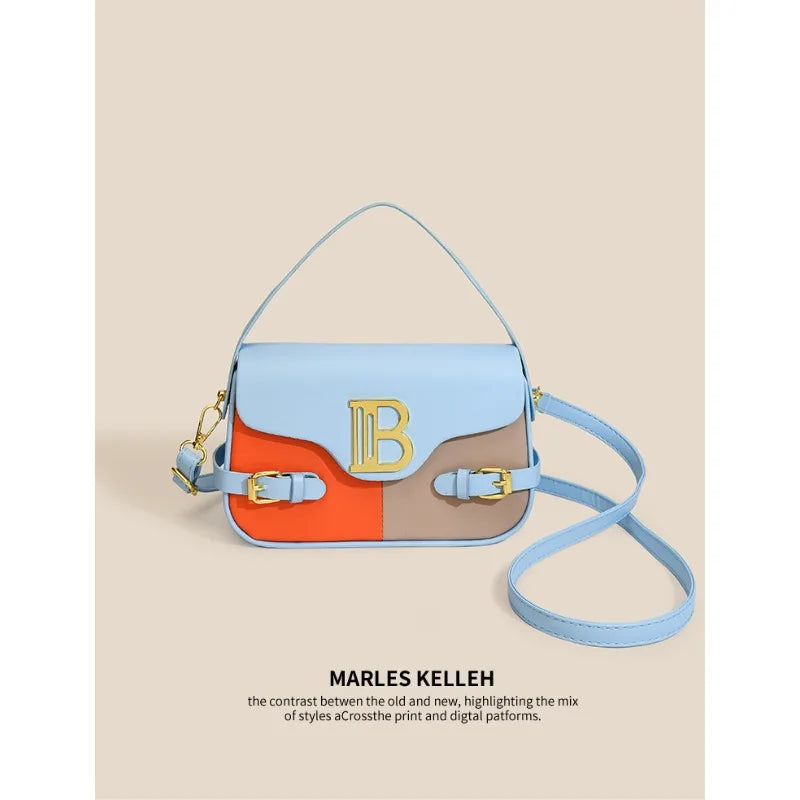 Luxury women's crossbody bag with color-blocking and stitching, box-style multi-color textured light luxury commuter bag.