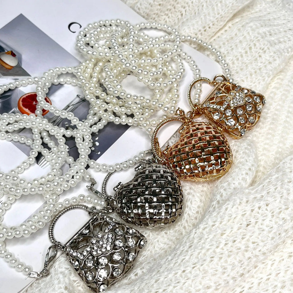 Designer hollowed out heart shaped dinner bagS for women fashionable metal style shoulder bag  mini accessory bag