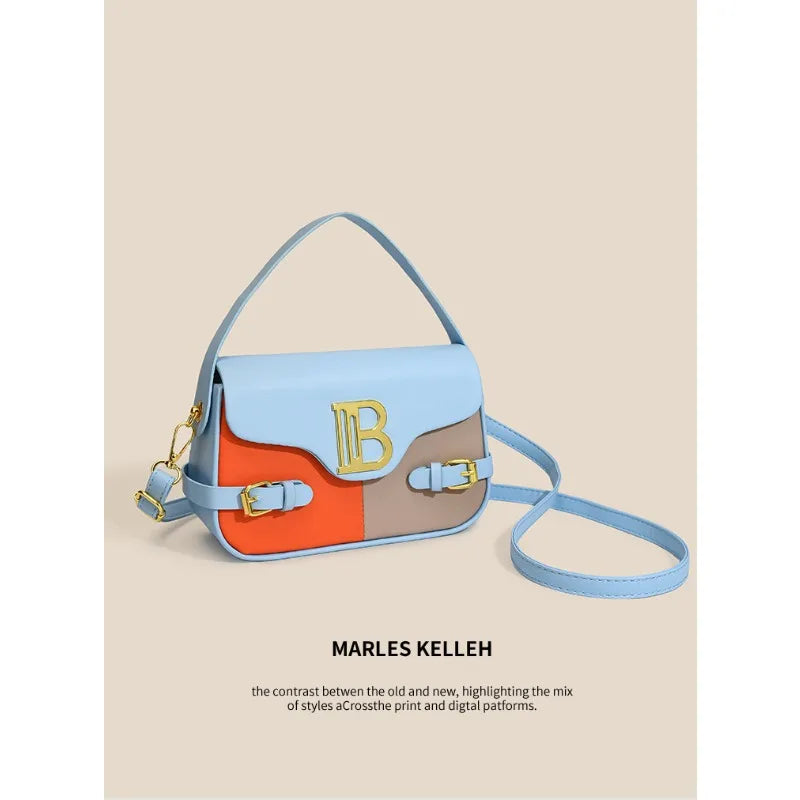 Luxury women's crossbody bag with color-blocking and stitching, box-style multi-color textured light luxury commuter bag.