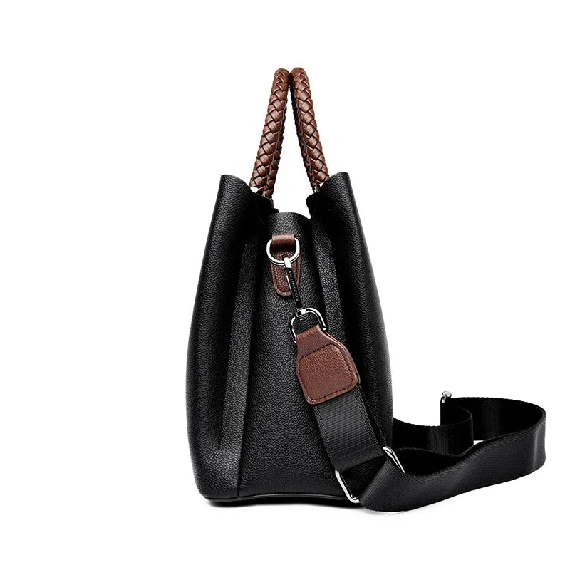 Elegant Women's Handbag Unique Handle Design Featuring a Stylish Pattern Spacious Interior  Adjustable Strap Functionality