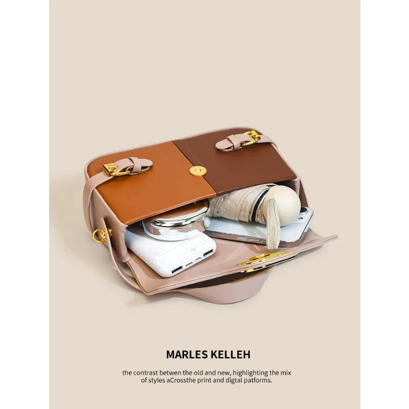 Luxury women's crossbody bag with color-blocking and stitching, box-style multi-color textured light luxury commuter bag.