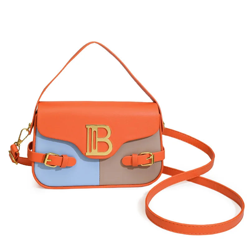 Luxury women's crossbody bag with color-blocking and stitching, box-style multi-color textured light luxury commuter bag.