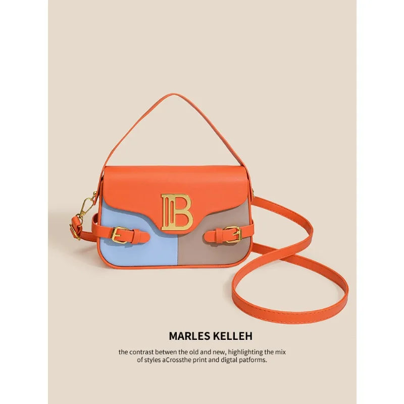 Luxury women's crossbody bag with color-blocking and stitching, box-style multi-color textured light luxury commuter bag.