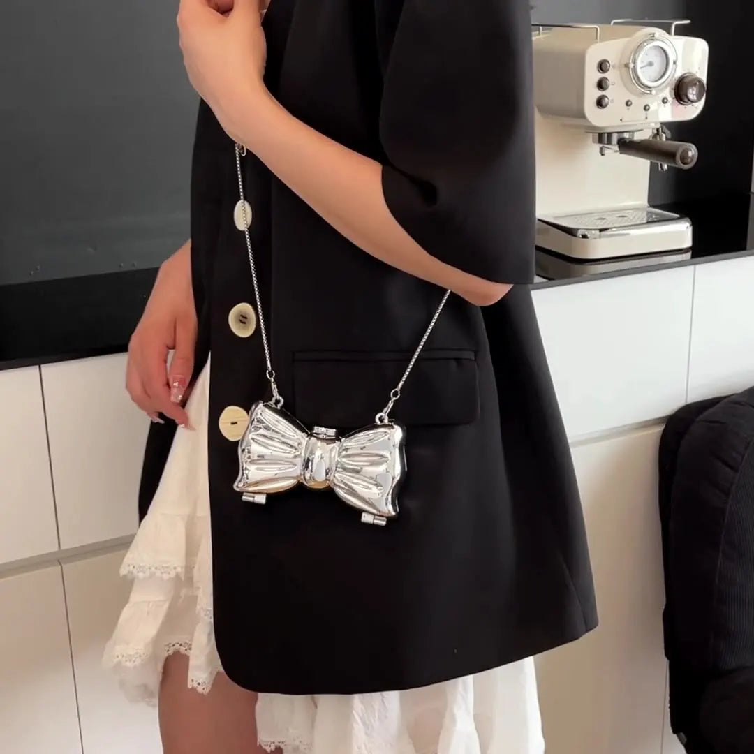 Luxury Fashion Metal Mini Handbag with Bow Clasp Playful Acrylic Bow Design with Shimmering European-Style Chain Crossbody Bag