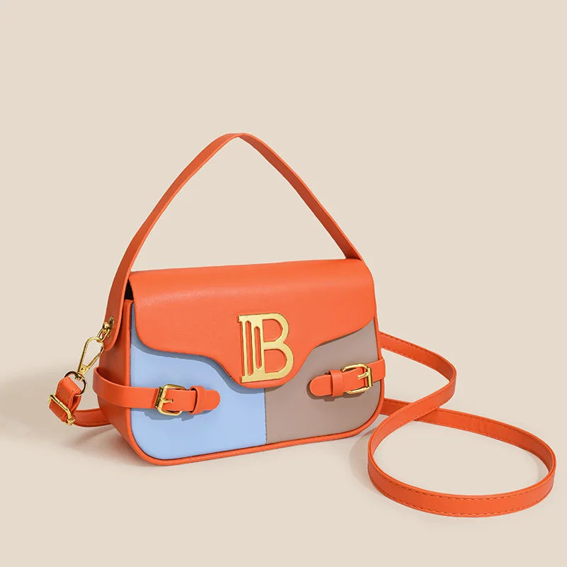 Luxury women's crossbody bag with color-blocking and stitching, box-style multi-color textured light luxury commuter bag.