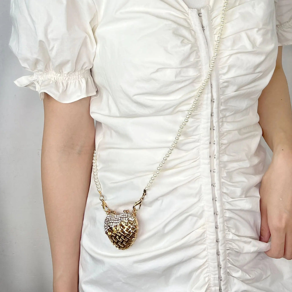 Designer hollowed out heart shaped dinner bagS for women fashionable metal style shoulder bag  mini accessory bag