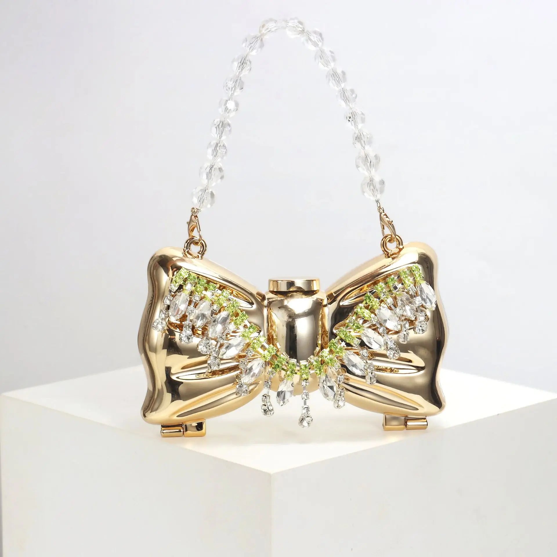 Luxury Fashion Metal Mini Handbag with Bow Clasp Playful Acrylic Bow Design with Shimmering European-Style Chain Crossbody Bag