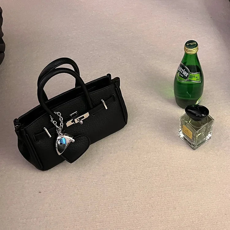 2025 new platinum bag women's versatile commuter high-end handbag messenger bag high value foreign shoulder bag