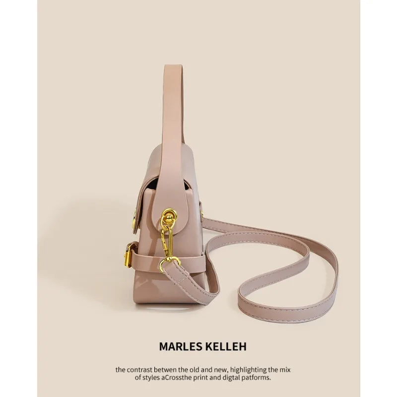 Luxury women's crossbody bag with color-blocking and stitching, box-style multi-color textured light luxury commuter bag.