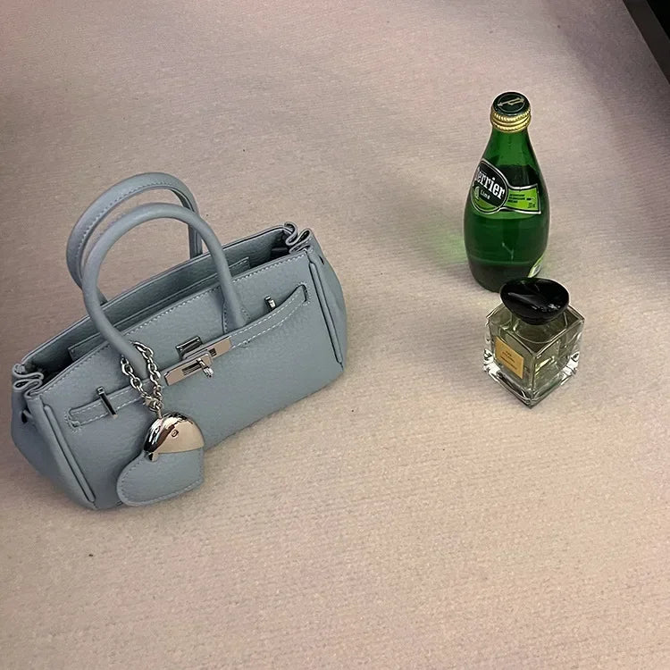 2025 new platinum bag women's versatile commuter high-end handbag messenger bag high value foreign shoulder bag