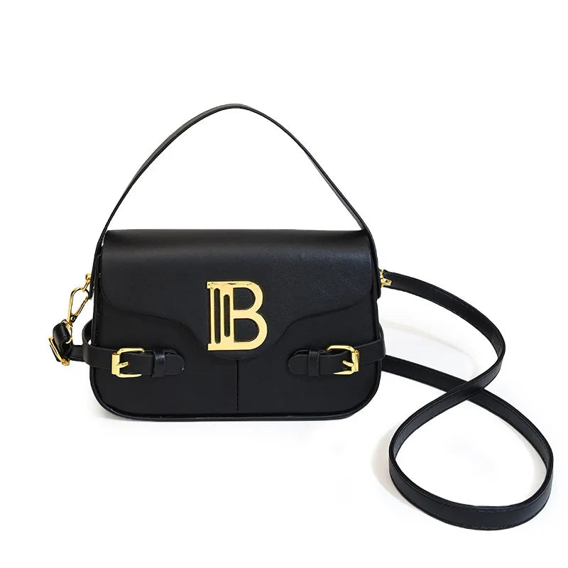 Luxury women's crossbody bag with color-blocking and stitching, box-style multi-color textured light luxury commuter bag.
