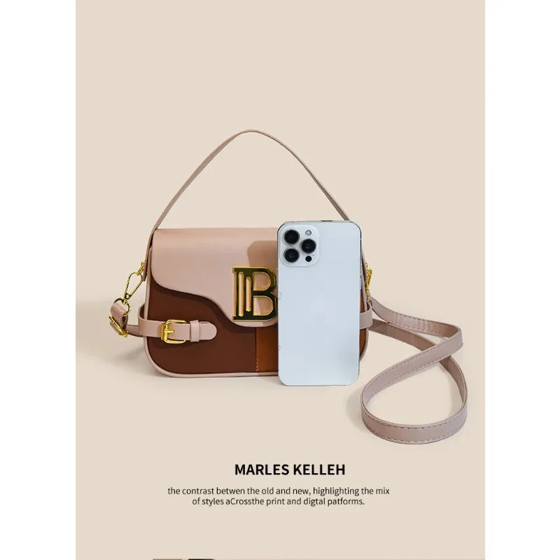 Luxury women's crossbody bag with color-blocking and stitching, box-style multi-color textured light luxury commuter bag.