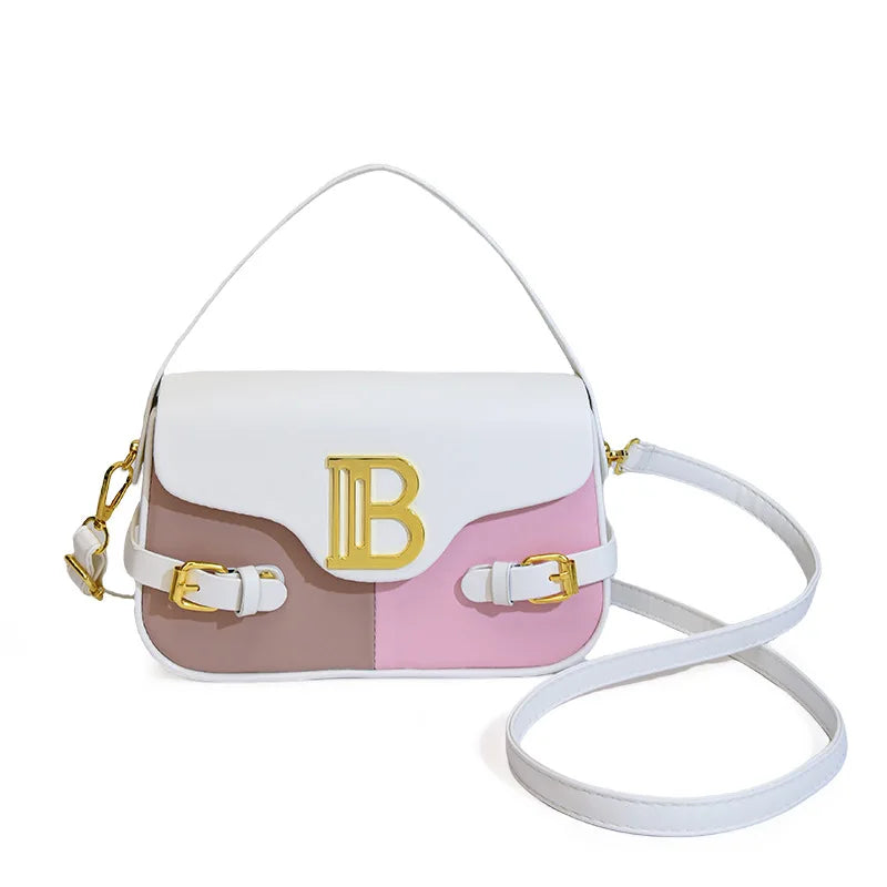 Luxury women's crossbody bag with color-blocking and stitching, box-style multi-color textured light luxury commuter bag.