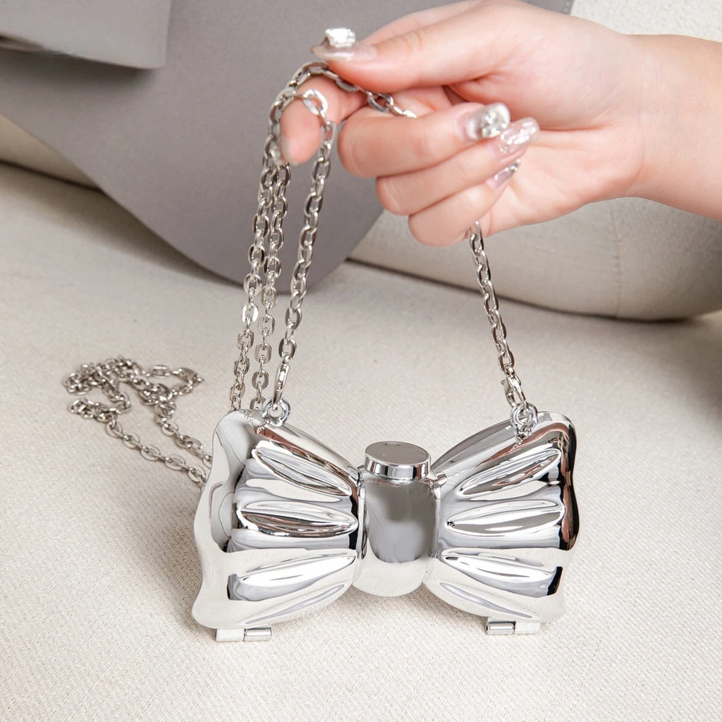 Luxury Fashion Metal Mini Handbag with Bow Clasp Playful Acrylic Bow Design with Shimmering European-Style Chain Crossbody Bag